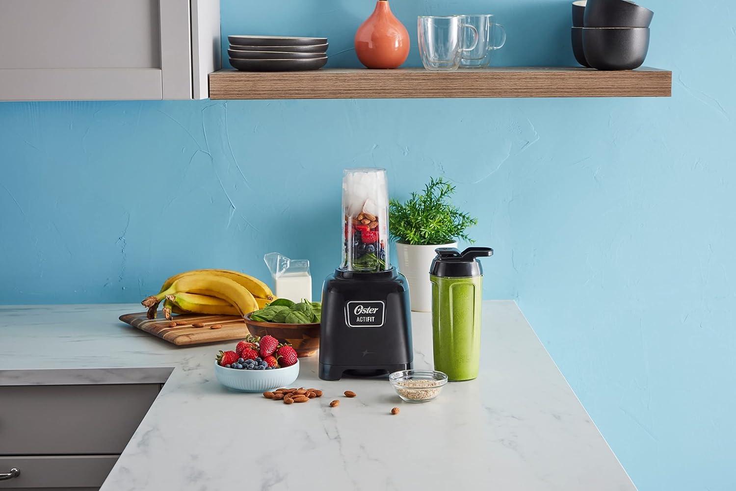 image:imageOster Personal Blender for Shakes Smoothies and Single Serve Portable Cups with 2 20ounce OntheGo Spill Proof Cups and Lids BPAFree amp DishwasherSafe Black